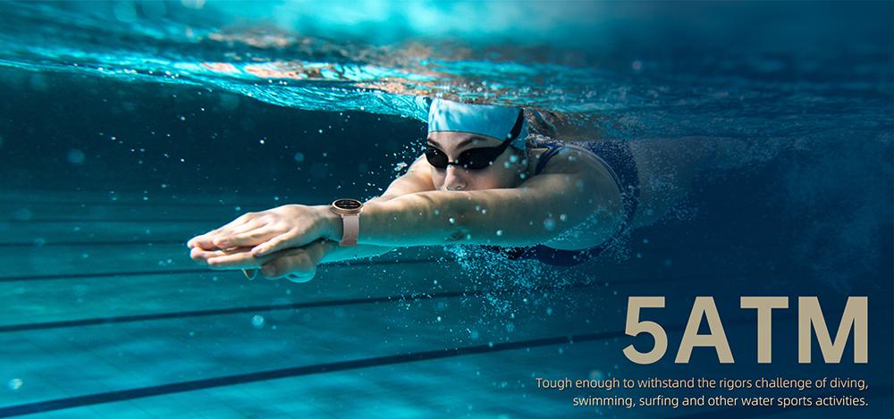 Person swimming underwater with a watch and swim cap, featuring 5ATM text.