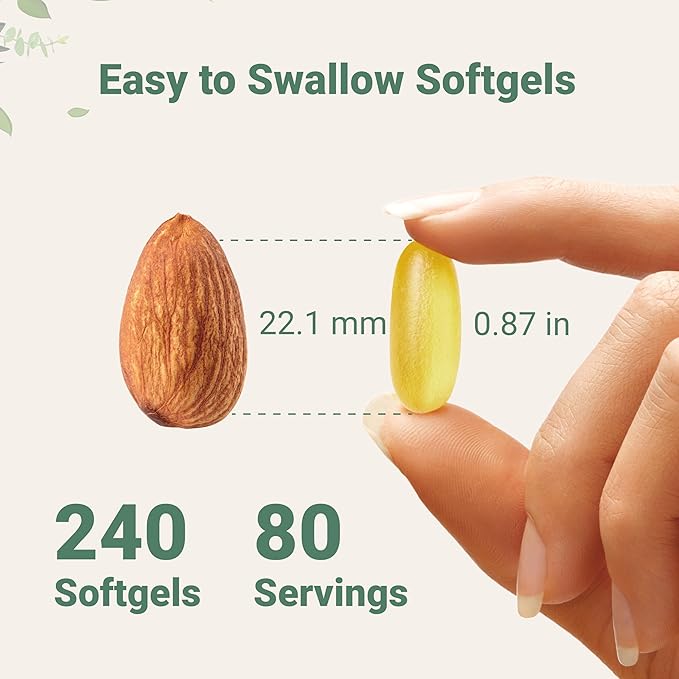 Vitamin supplement softgel next to an almond with measurement details on a light green background